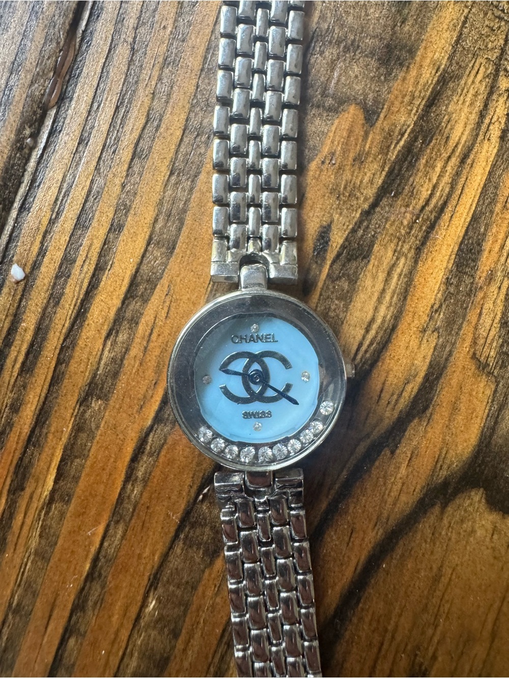 CHANEL Silver Bracelet Watch with Light Blue Dial and Crystal Accents
